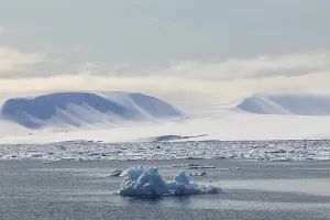 Drift ice, sea ice, sea, mountain range