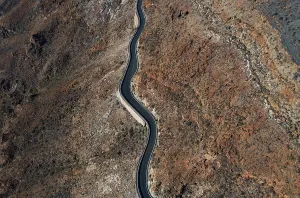 Drone shot, mountain road at the Degollade de las Yeguas viewpoint