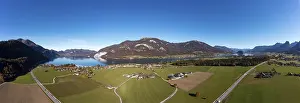 Category Mountain Landscapes Prints: Drone shot, panoramic view of the village of Abersee with Wolfgangsee and Schafberg
