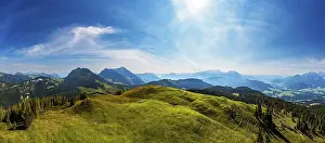 Category Mountain Landscapes Prints: Drone shot, at the summit of the Taborberg with a view of the Osterhorn group and Dachstein massif