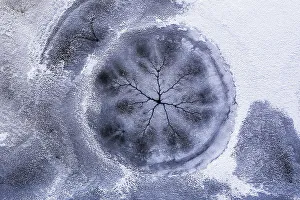 Drone view. Abstract forms created on surface of freezing lake