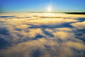 Drone view of sunrise with clouds over valley Remstal in autumn