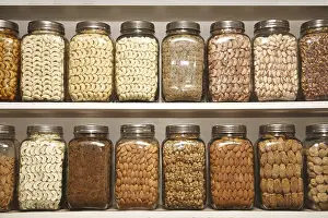 Category Historic EN Prints: Dry fruits kept in different glass jars on selves in shop