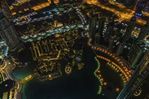 Dubai downtown night scene with city lights
