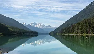 Duffey Lake, snow-capped mountains seal themselves in a lake