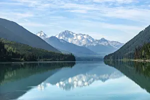 Duffey Lake, snow-capped mountains seal themselves in a lake