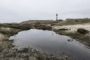 Dune landscape with lighthouse