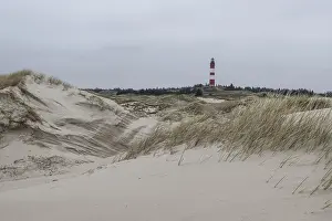 Dune landscape with lighthouse