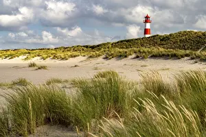 Dunes at the coast of Ellenbogen and the lighthouse List-Ost