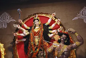 Category Historic EN Prints: Durga clay model killing demon mahishasura on Durga puja