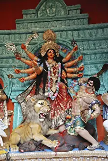 Category Historic EN Prints: Durga clay model killing demon mahishasura on Durga puja