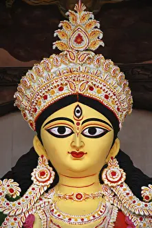 Category Historic EN Prints: Durga clay model showing third eye open on Durga puja