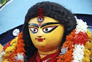 Category Historic EN Prints: Durga clay model showing third eye open on Durga puja