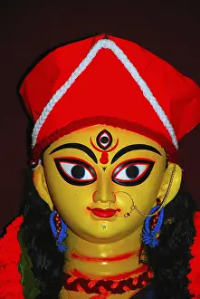 Category Historic EN Prints: Durga clay model showing third eye open on Durga puja