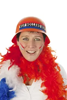 Dutch woman dressed in orange as a soccer fan
