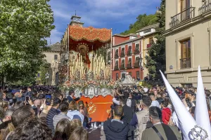 Easter procession Semana Santa with decorated altars the Pasos and Nazarenos in white clothes
