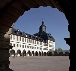 Eastern pavilion and southern part of the east wing seen through the arcade from the north-west