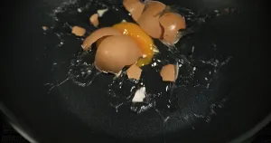 Egg bursting into a stove