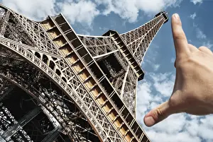 Eiffel tower in Paris on blue sky background wide angle measuring tower palm
