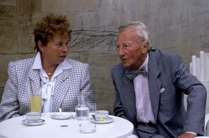 Elderly couple in a street cafe