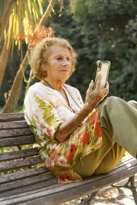 Elderly woman enjoying a tranquil moment in the park
