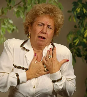 Elderly woman with pain, heart pain, heart attack