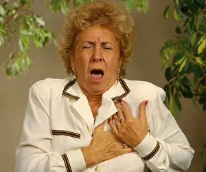 Elderly woman with pain, heart pain, heart attack