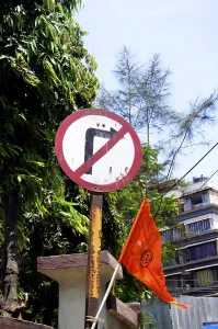 Election flag of bajrang dal with traffic sign suggesting please do not go on right