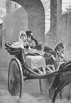 Two elegant young ladies ride carriage to bullfight