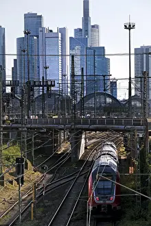 Elevated city view with regional train and skyscrapers