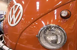 The front end of a Volkswagen bus with large VW logo