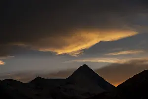Engadine mountains with cloudy sky at sunset