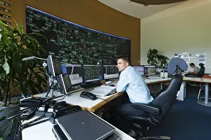 Engineer sitting at his work station in the Transmission Control Center