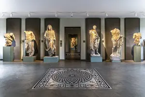 Entrance hall with sculptures and mosaic floors