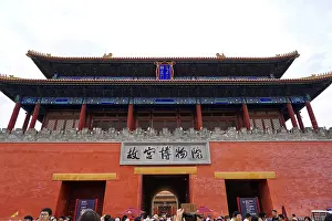 Framed Print : Entrance to a museum with red facade and traditional architecture Framed Print : Entrance to a museum with red facade and traditional architecture