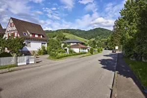 Entrance to town, detached house