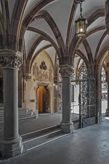 Entrance to the town hall with columns and wrought-iron Tor tor