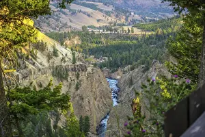 An epic scenery of the canyon in between of those large mountain ranges
