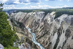 An epic scenery of the canyon in between of those large mountain ranges