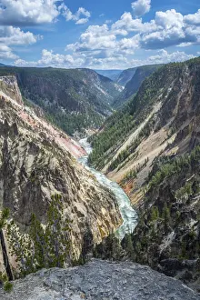 An epic scenery of the canyon in between of those large mountain ranges