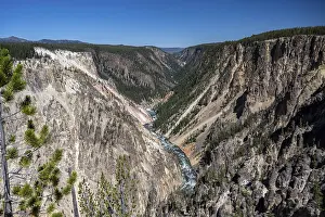An epic scenery of the canyon in between of those large mountain ranges