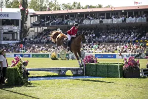 Category Historic EN Prints: Erynn Ballard of Canada and riding De Flor 111 Z Santa Rosa compete in the first round of the 1