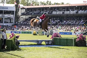 Category Historic EN Prints: Erynn Ballard of Canada and riding De Flor 111 Z Santa Rosa compete in the first round of the 1
