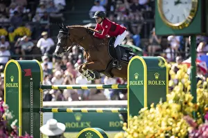 Erynn Ballard of Canada and riding De Flor 111 Z Santa Rosa compete in the first round of the 1
