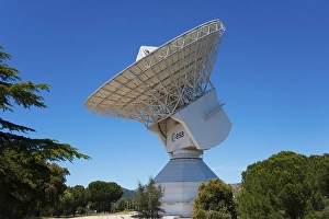 ESA's large radio telescope under a clear blue sky