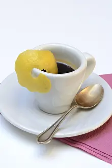 Espresso Romano, cup of espresso with lemon zest