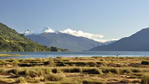 The Estero Reloncavi near Cochamo in southern Chile with the snow-capped volcano Yate