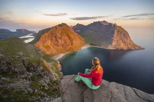 Evening atmosphere, hiker on top of Ryten