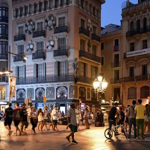 Evening atmosphere, people at Placa de la Boqueria