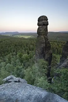 Evening mood from Pfaffenstein table mountain with the Barbarine rock formation in the Elbe Sandstone Mountains